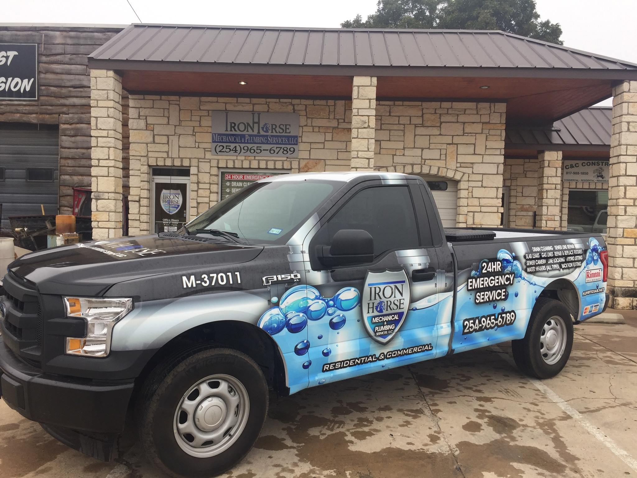 Iron Horse Mechanical & Plumbing Services branded truck, license M-37011, parked outside the company's Stephenville, TX office