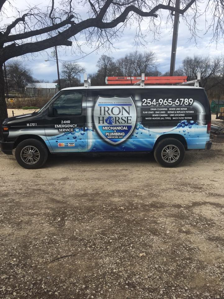 Iron Horse Mechanical & Plumbing Services 24-hour emergency service van with company phone number, parked and ready to respond to plumbing emergencies in Stephenville, TX